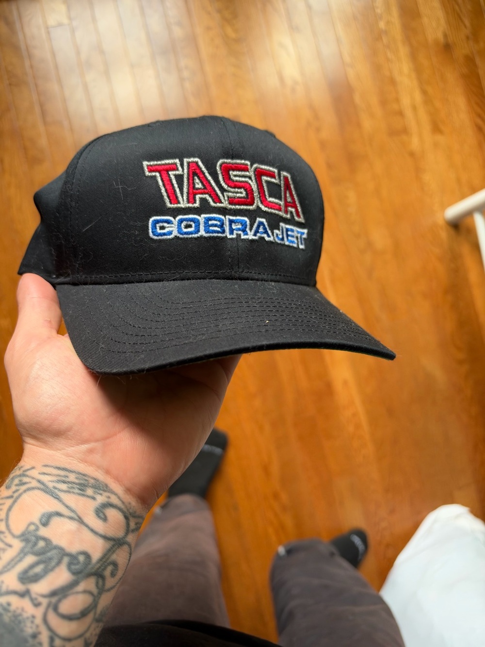Itasca Black Hat with Red and Blue TASCA CobraJet Embroidery